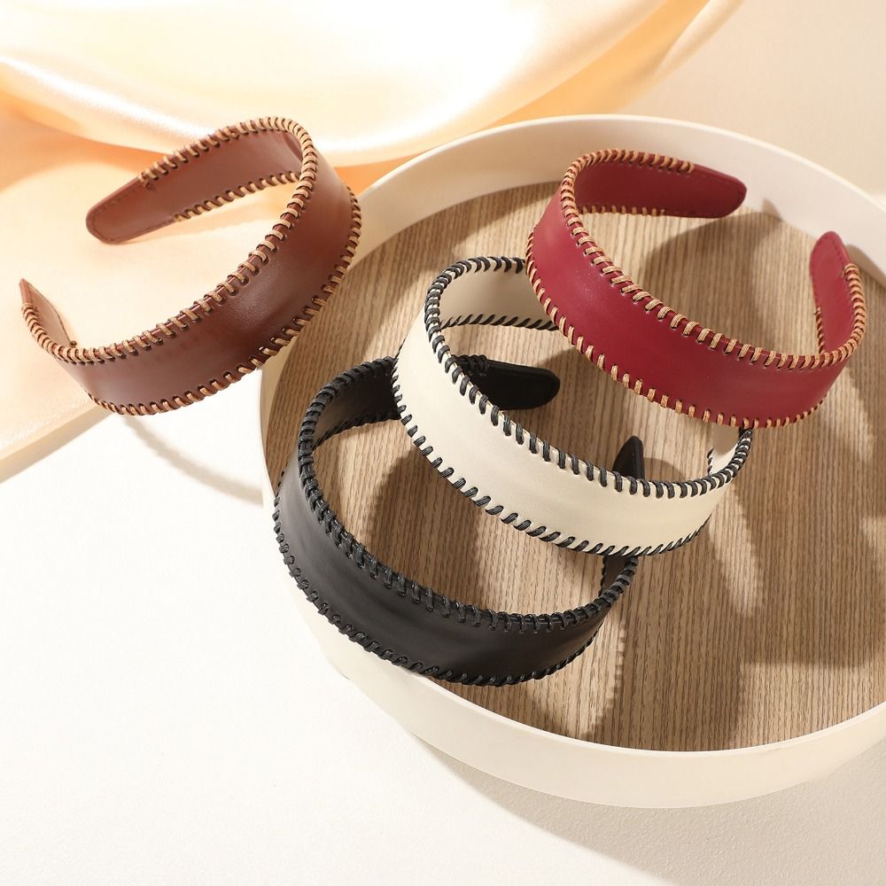 Leatherwork Rings - عصابة رأس جلدية بلون موحد على