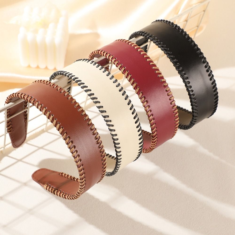 عصابة رأس جلدية بلون موحد على  - مراجعة Leatherwork Rings وسعره